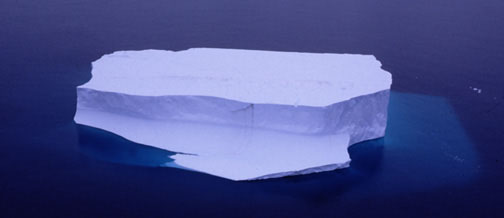 Tabular iceberg showing much of its mass below the waterline. 